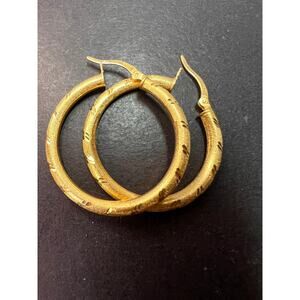 Satin finish diamond cut hoop earrings in yellow gold over sterling silver